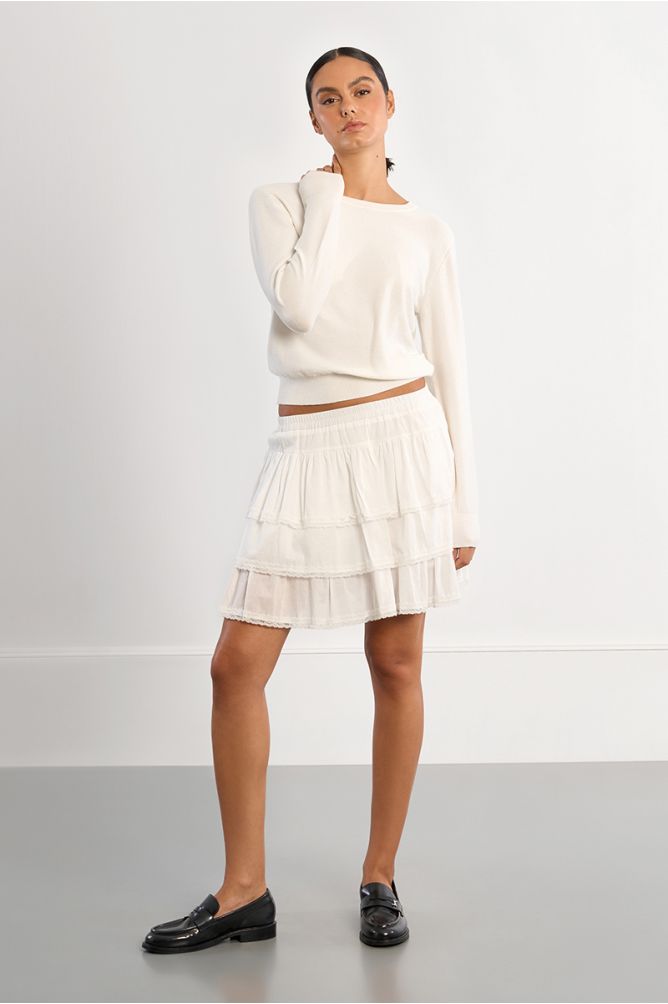 Jersey de mujer de manga larga, detalle brillantitos.