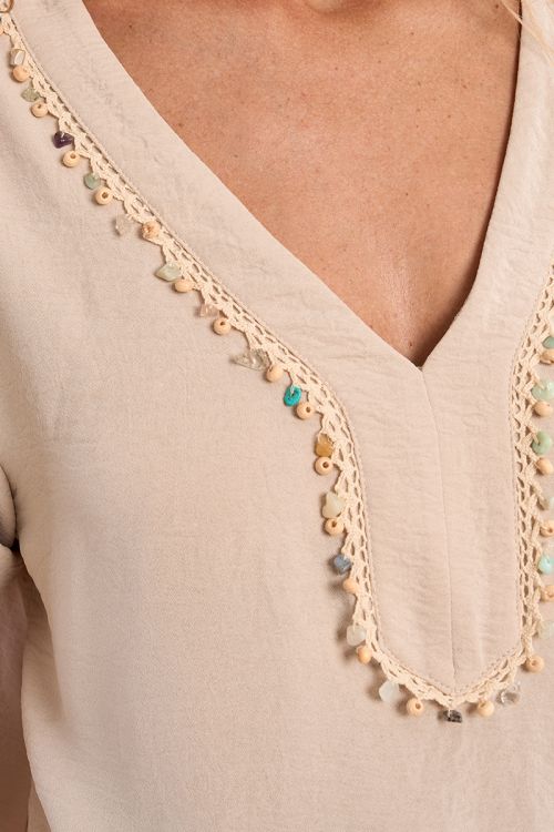 T-shirt with beaded collar