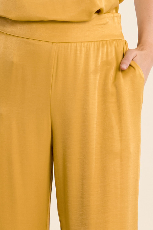 Pantalón de mujer largo, perneras anchas.