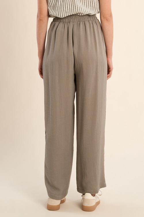 High-waisted, flared trousers