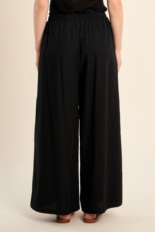 Wide pants, beaded drawstrings