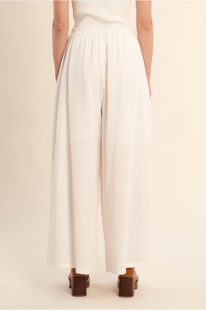 Wide pants, beaded drawstrings