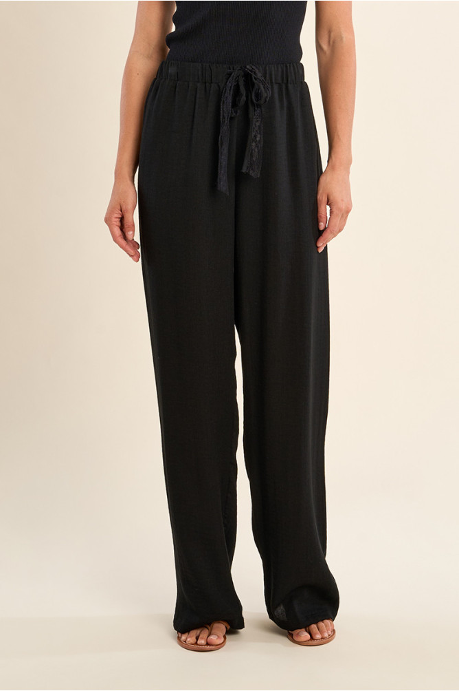 Pantalón de mujer largo, con lazada.