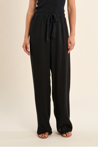 Pantalón de mujer largo, con lazada.