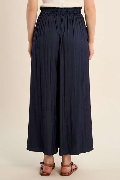 Pantalón de mujer tobillero, perneras anchas.