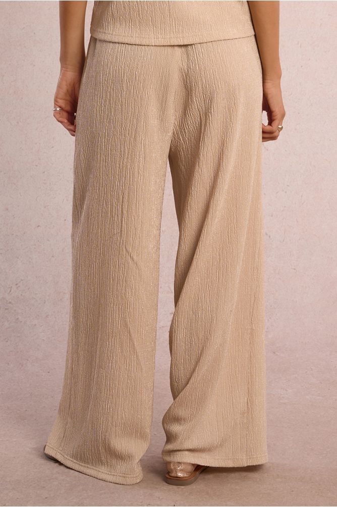 Straight, flowing trousers in semi-sheer