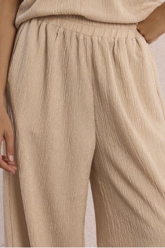 Straight, flowing trousers in semi-sheer