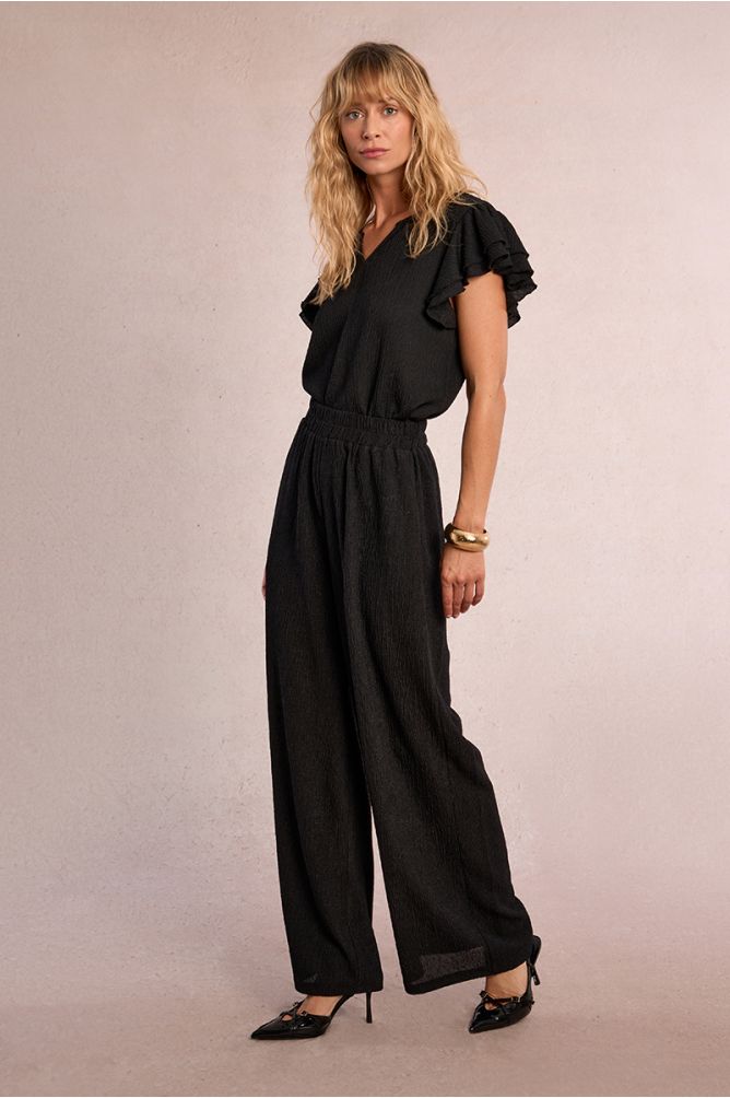 Straight, flowing trousers in semi-sheer