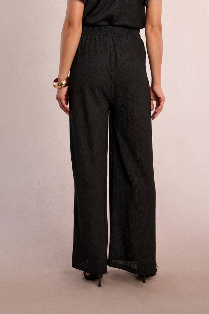 Straight, flowing trousers in semi-sheer