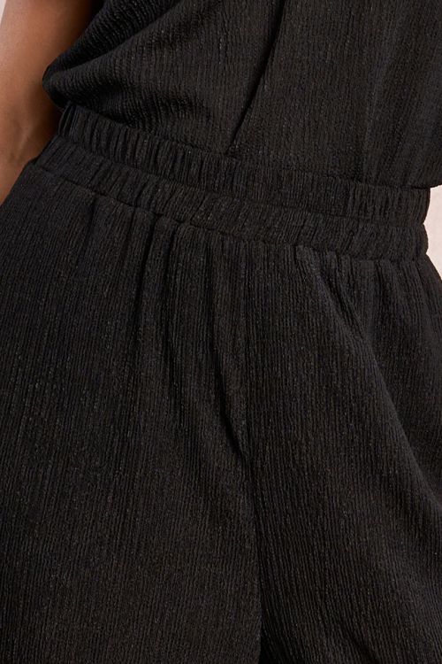 Straight, flowing trousers in semi-sheer