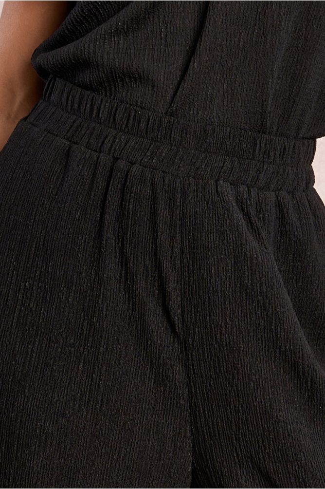 Pantalon droit et fluide en semi-transparence