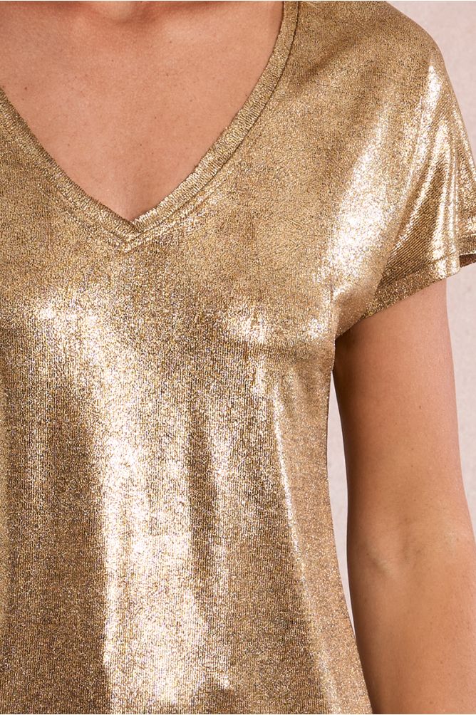 Camiseta de mujer de manga corta, en tejido metalizado.
