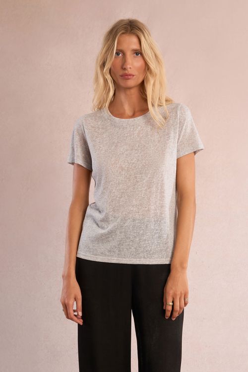 Camiseta de mujer de manga corta, tejido brillante.