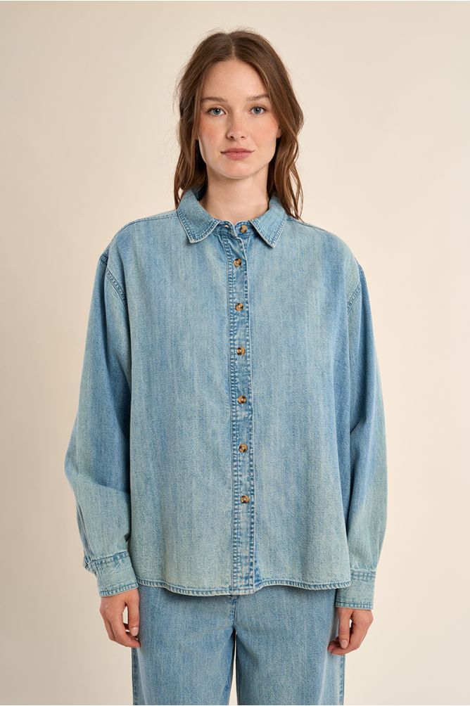 Denim shirt with bead detailing.