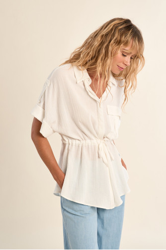Safari blouse, knotted at the waist
