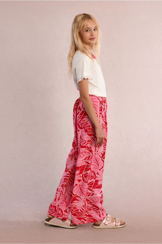 Pantalón de niña largo, con pliegues y estampado.