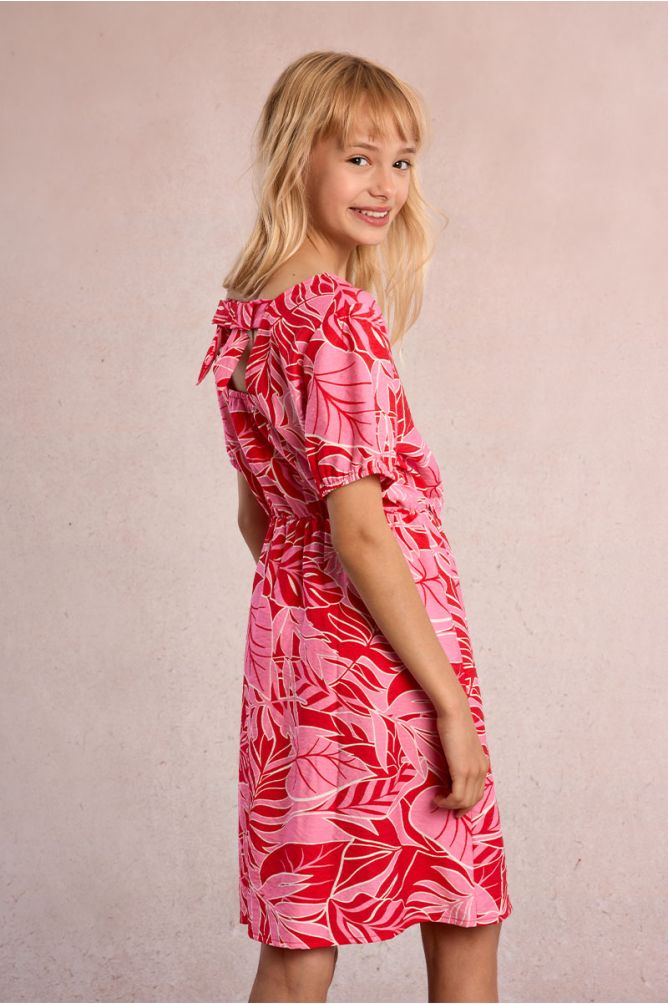 Vestido de manga corta, con estampado y lazada.