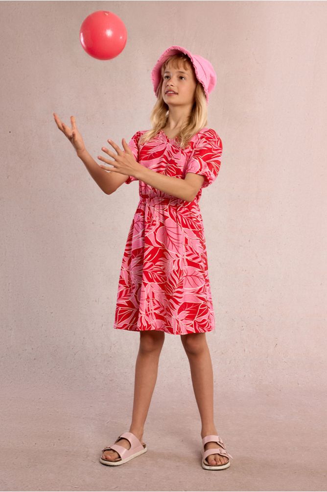 Vestido de manga corta, con estampado y lazada.