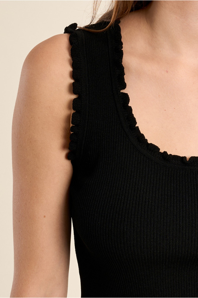 Top de mujer sin manga, con volantes.