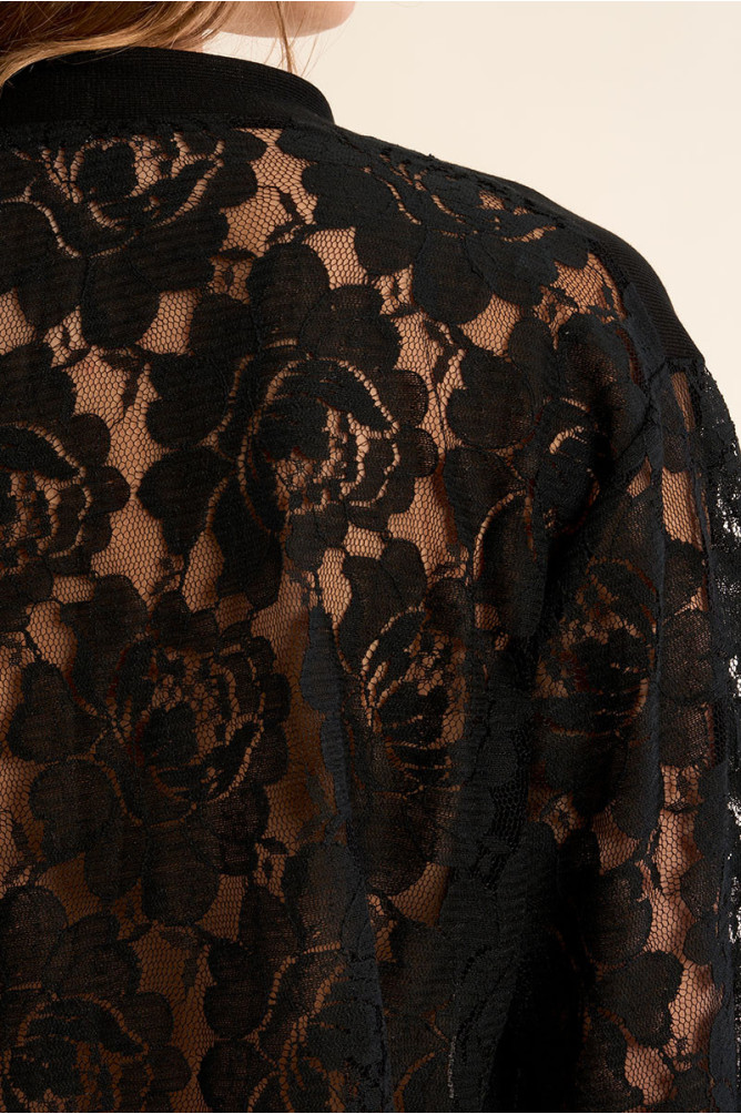 Vest with lace sleeves