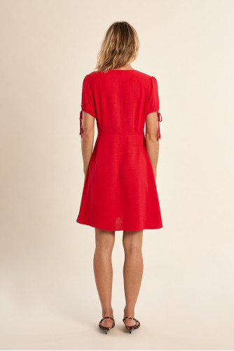 Short dress with knotted sleeves