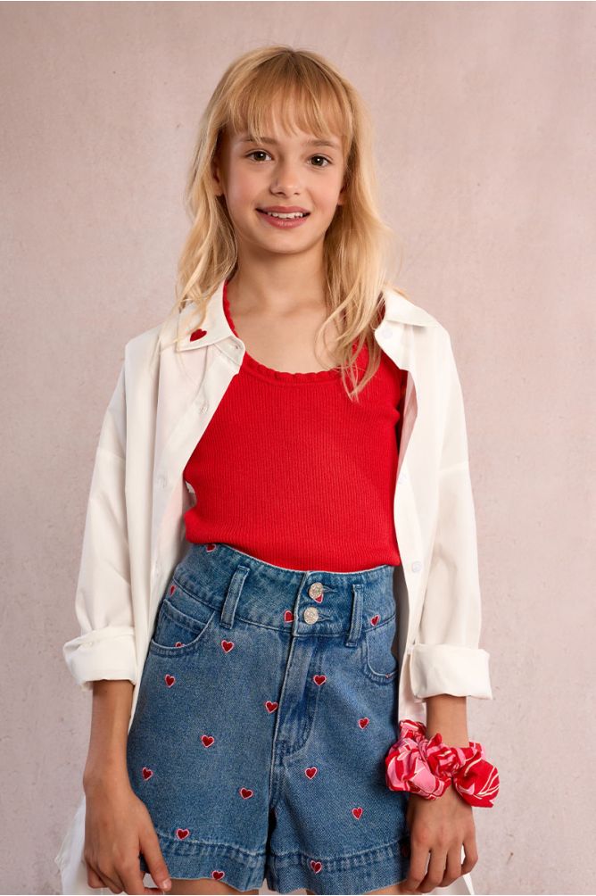 Top de niña sin manga, detalle volentes.