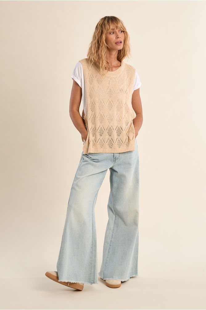 Sleeveless knit, openwork and knotted on the sides
