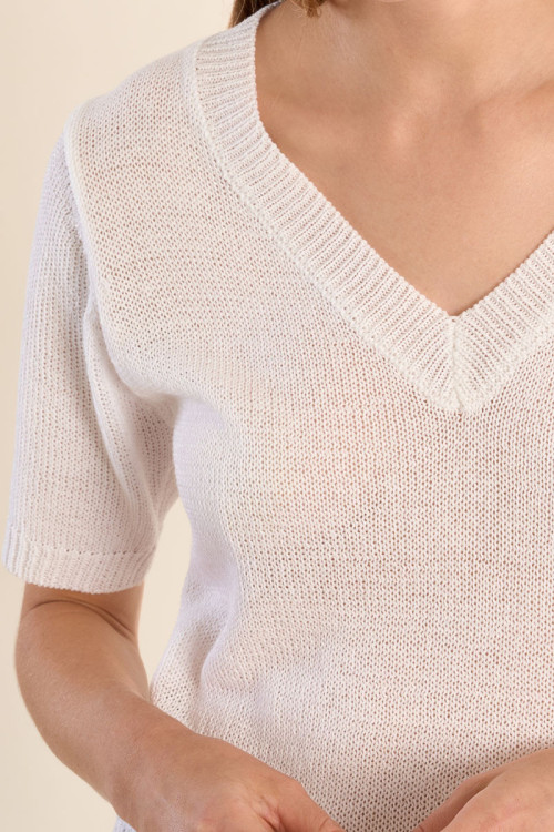 Jersey de mujer de manga corta, escote en V.