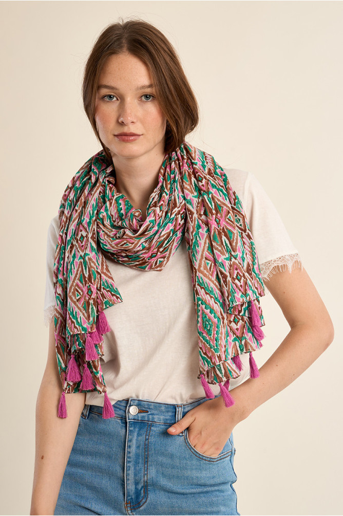 Pañuelo de mujer con estampado y borlas.