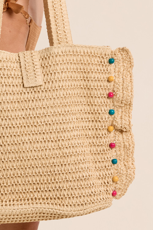 Bolso de mujer de mano, trenzado, de rafia.