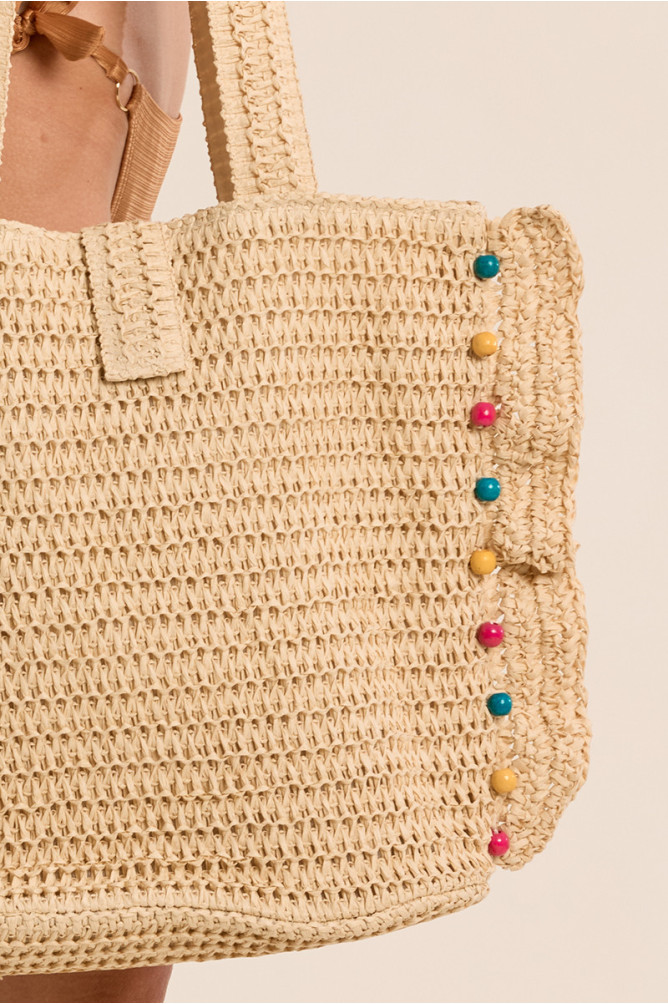 Bolso de mujer de mano, trenzado, de rafia.