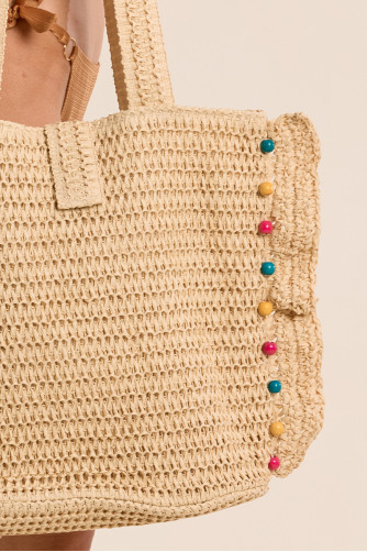 Bolso de mujer de mano, trenzado, de rafia.