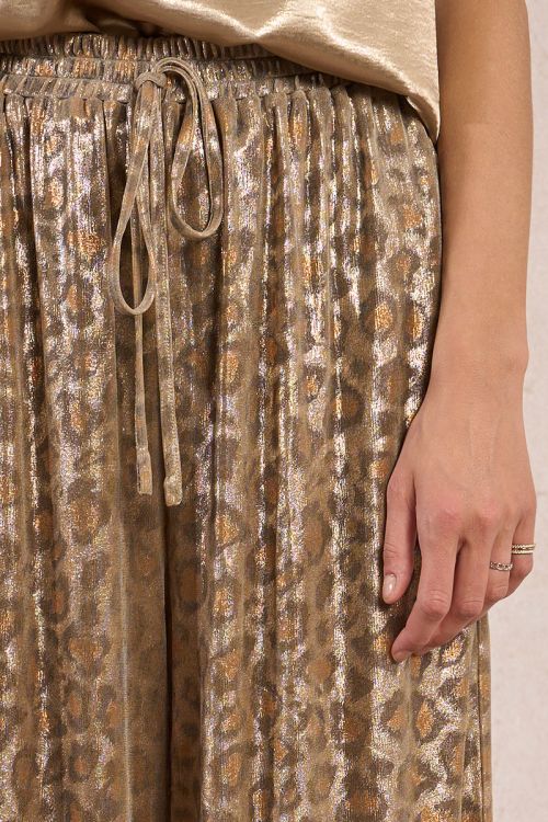 Flowing leopard print trousers, iridescent