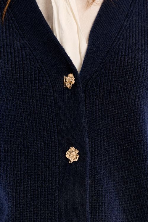 Knitted cardigan, sleeveless