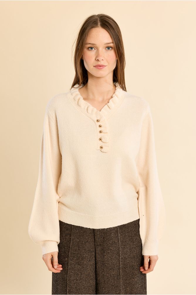 Knitted sweater with ruffled collar