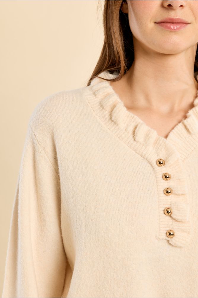 Pull en maille col volanté
