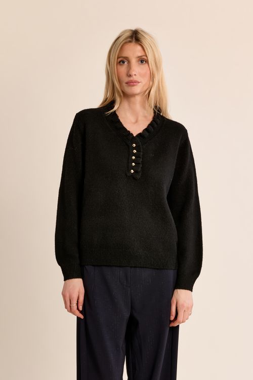 Pull en maille col volanté