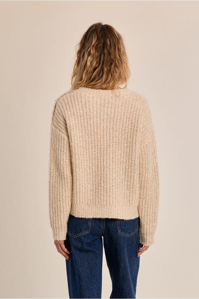 Pull en maille, détail bouton