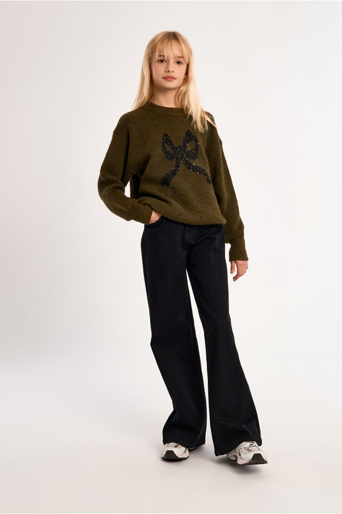 Pantalón vaquero con perneras anchas