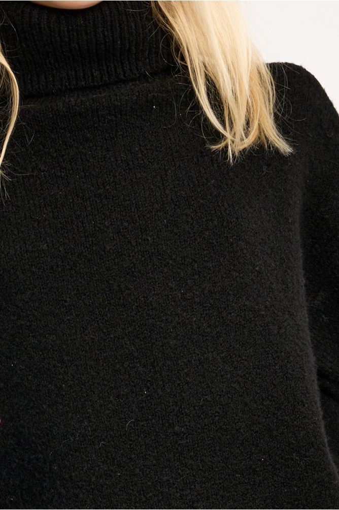 Pull oversize, col roulé