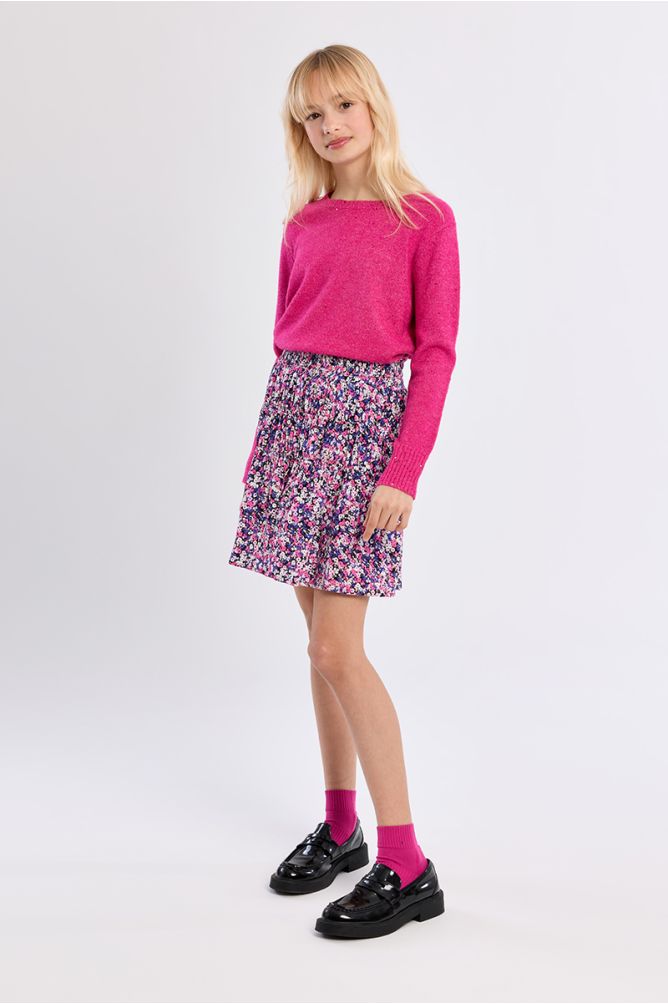 Falda corta con estampado y volantes