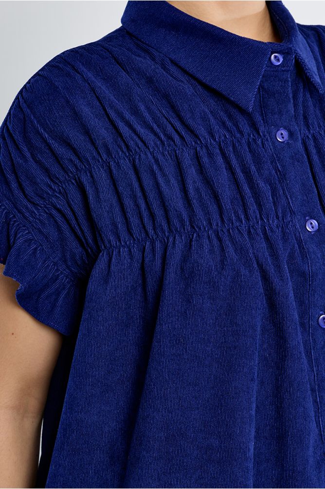 Vestido corto camisero detalle pliegues