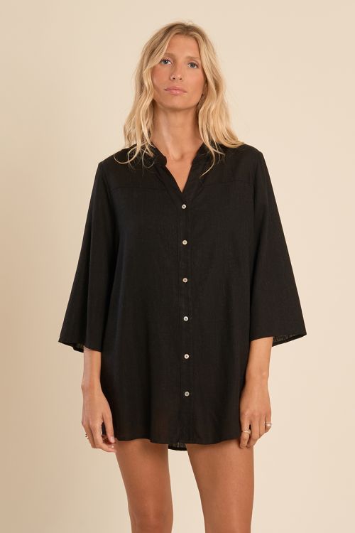 Camisa de mujer de media manga, muy amplia.