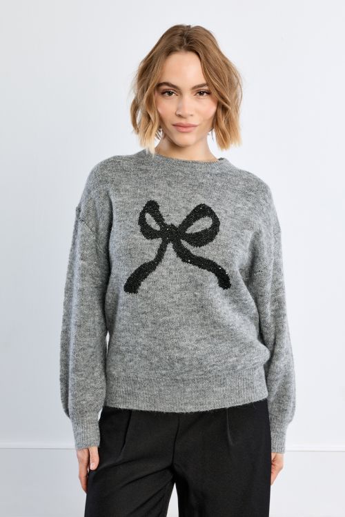 Knitted sweater, bow pattern