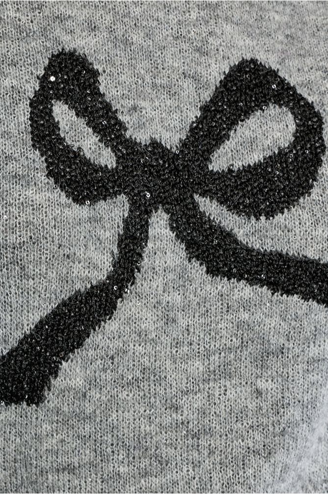 Pull en maille, motif nœud