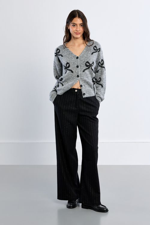 Knitted cardigan, bow patterns