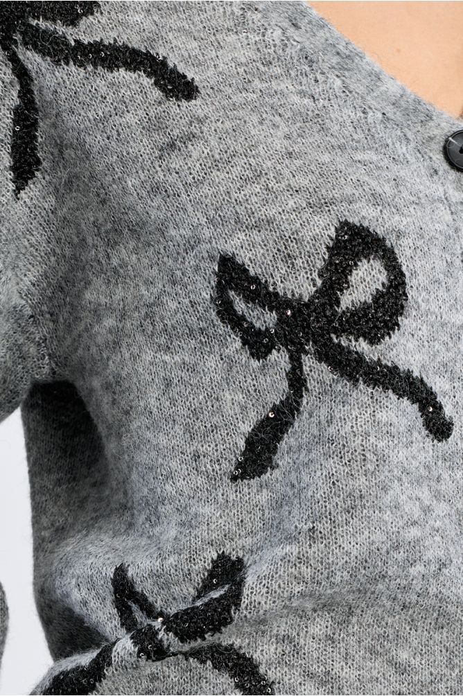 Cardigan en maille, motifs nœuds