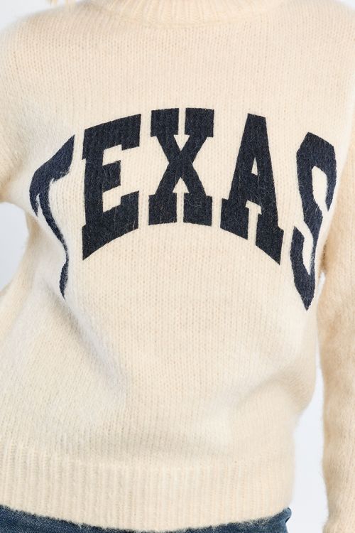 "Knitted sweater, with ""Texas"" inscription"