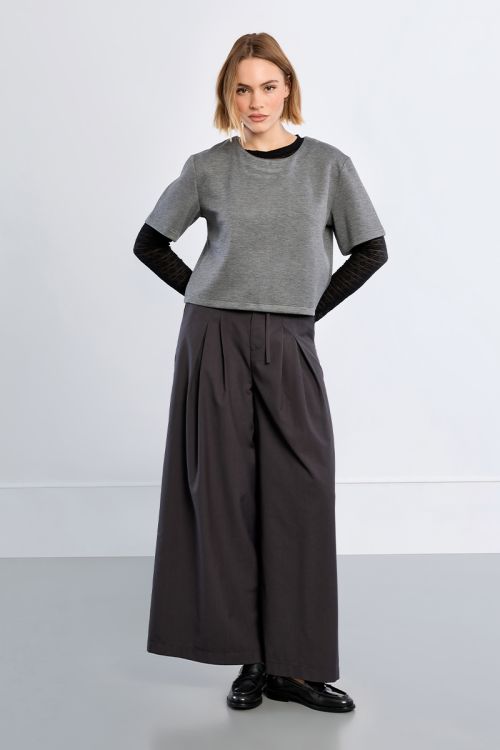 Baggy trousers, pleated