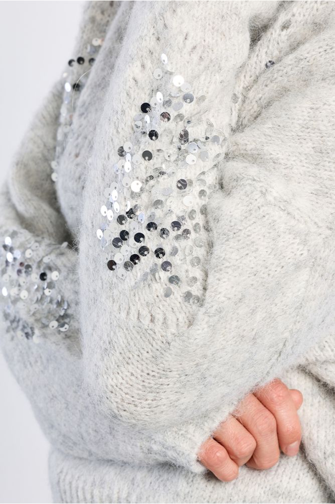 Plaid and rhinestone sweater